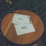 engagement-envelopes-on-stool-top